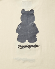 SHORT SLEEVE GRAPHIC MONEY BEAR T-SHIRT (APRICOT)