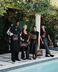 SAWTOOTH SHARKS IN PARIS MESSENGER SLING