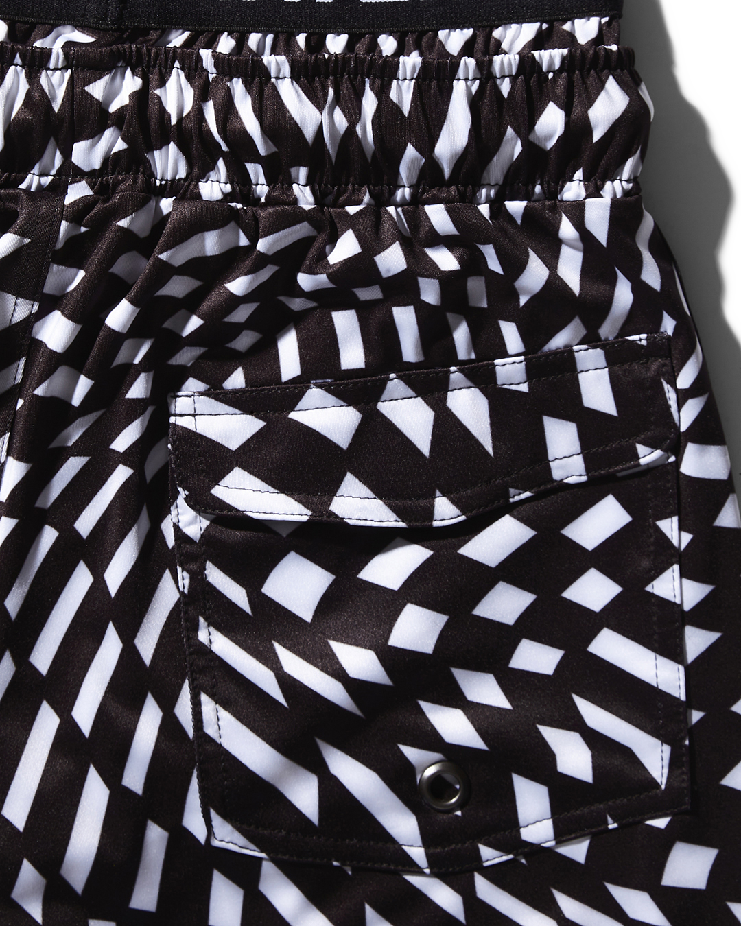 KIDS TRIPPY SWIM TRUNKS